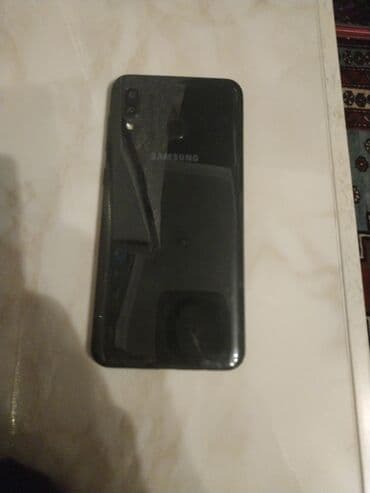 Mətbəx texnikası: Samsung Galaxy A20, 32 GB, rəng - Qara, Barmaq izi — 2
