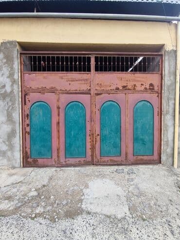 Dəmir Qaraj darvazası, Mexaniki, Qapı ilə