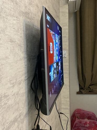 soyuducular ucuz: SMART TV – divara quraşdırılmış, tətbiqlərlə işləyən televizor — 2
