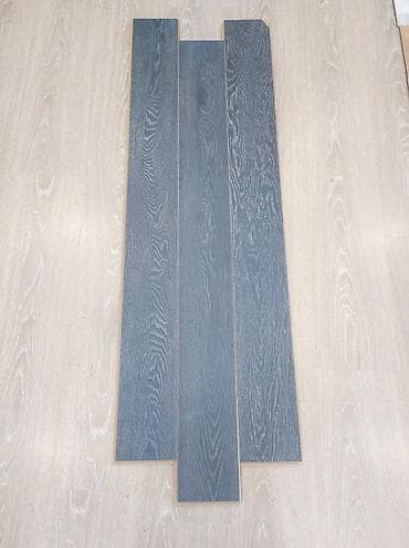 bak cen: Tünd boz rəngli taxta effektli döşəmə panelləri - Material: laminat — 1