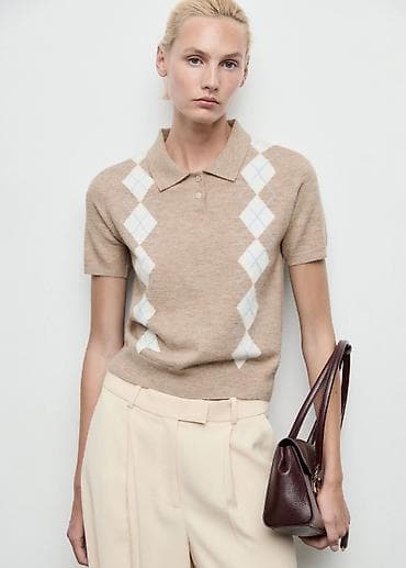 MANGO polo yaxa triko kofta 
bir neçe defe geyilib teze kimidir