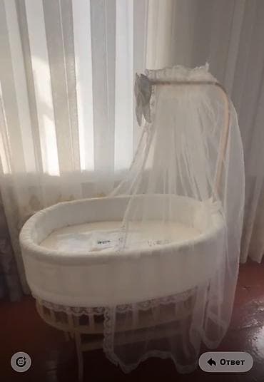 Mebel: Oval formalı beşik – zərif baldaxınlı - Oval dizaynlı körpə beşiyi — 1
