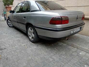 06 sekileri: Opel Omega: 2 l | 1994 il 200000 km Sedan — 3