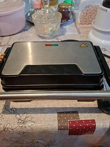 ucuz modem: Elektrik tost/sandviç presi aparatı satılır. İstəyən əlaqə saxlasın — 1