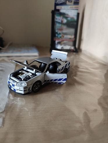 Книги и журналы: Kolleksiya üçün die-cast model avtomobil – Nissan Skyline GT-R R34 — 3