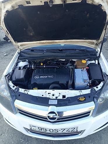 ford fusion karopka: Opel Astra: 1.3 л | 2009 г. Универсал — 8