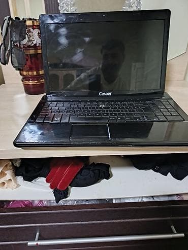 Masaüstü kompüterlər və iş stansiyaları: Casper noutbuk - Korpus: qara, parlaq üst qapaq. Alt hissədə — 7