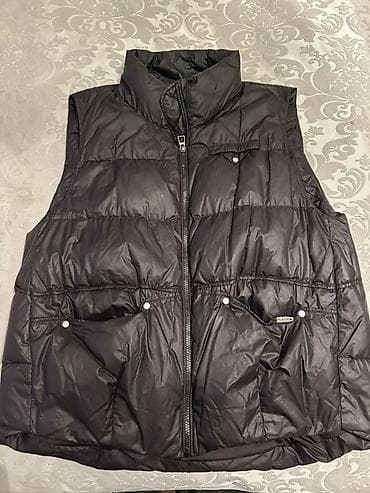 crop geyim: Qara rəngli şişmə jilet. Ecemiden Tangodan alinib 130 manata, satilir — 1