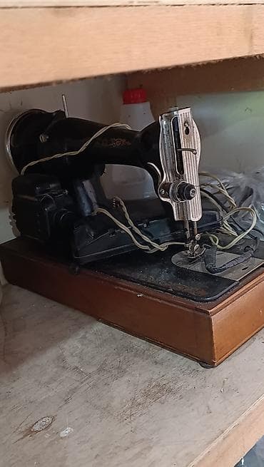 Məhsul: Köhnə tip elektrik tikiş maşını Təsvir: - Klassik, ağır tökmə — 1