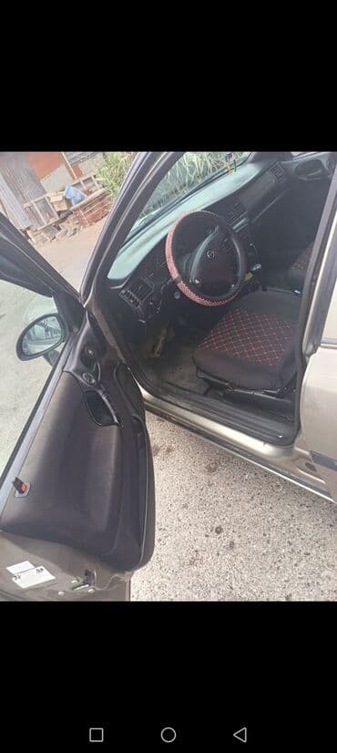 masinim var ag rengi: Opel sedan – komfortlu və praktik gündəlik minik avtomobili. - Kuzov — 2