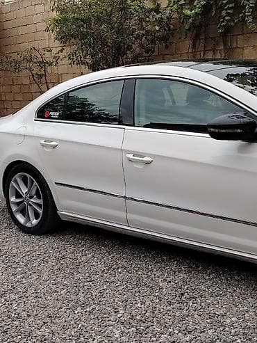 mercedes e class: Volkswagen Passat CC: 2 l | 2009 il Sedan — 5