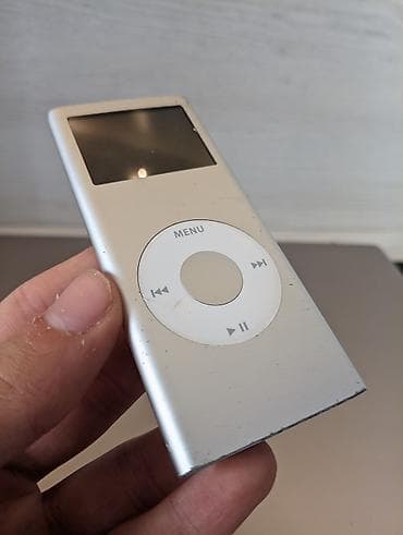Salam her vaxtiniz xeyir Apple iPod nano (2-ci nəsil) – 2 GB, gümüş