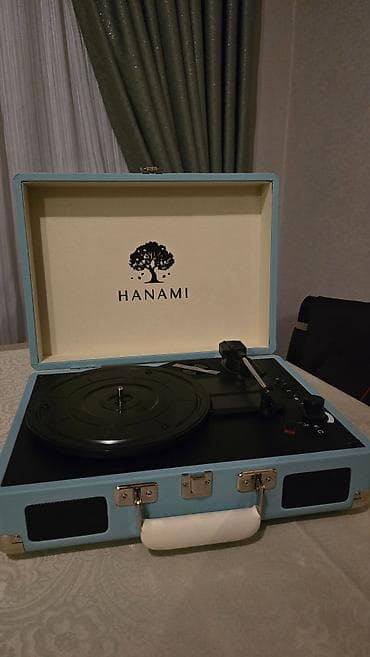 HANAMI portativ vinil pleyeri – çamadan tipli dizayn Xüsusiyyətlər: - — 6