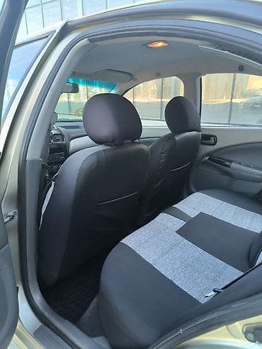 diffuser satisi: Nissan Sunny: 1.6 l | 2011 il Sedan — 6