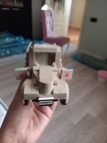 maraqli oyuncaqlar: LEGO tərzində yığılan Porsche yarış avtomobili modeli. Oyuncaq qara və — 10