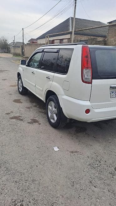 07 qabag bufer: Nissan X-Trail: 2.5 l | 2008 il Ofrouder/SUV — 4