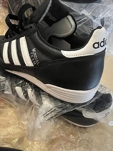 İdman və istirahət: Butslar Adidas — 1