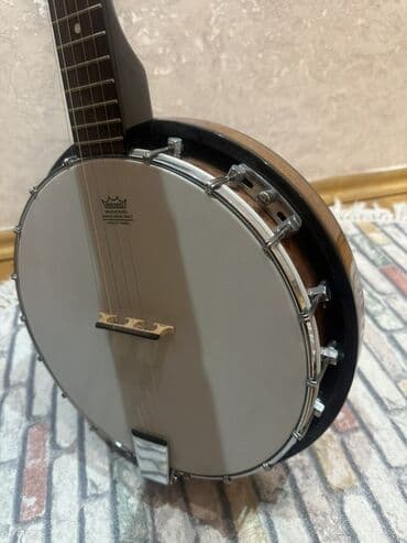Akkordeonlar: 5 simli banjo Çox az istifadə olunub yeni kimidir. Piano alacam deyə — 2