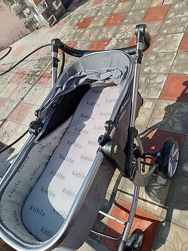 islenmis kalyaskalar: Çıxarıla bilən beşikli araba, Kidilo, Yaş: <1 ay — 3