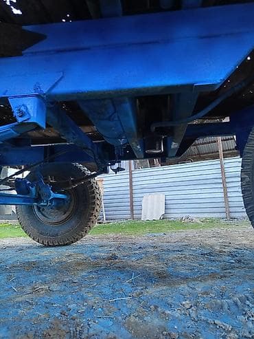 traktor 82 satisi az: Traktor qoşqusu – 2 oxlu, yanları açılan metal bortlu yük platforması — 7