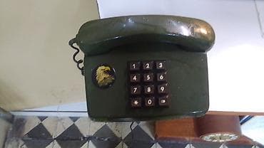 Stasionar telefon Simli