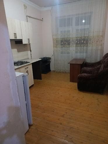 Mənzillər: 1 otaqlı mənzil – mətbəx-studiya planı - Geniş otaq: böyük pəncərə — 1