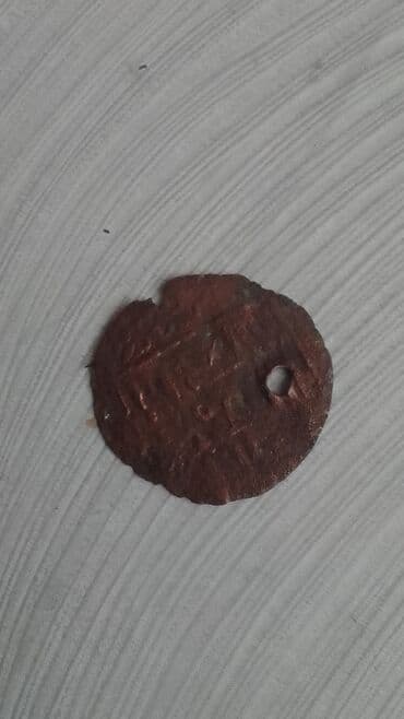 CD, DVD disklər və kassetlər: Məhsul: Köhnə mis sikkə (4 ədəd) Təsvir: - Material: mis - Say: 4 — 3