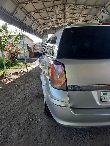 kia rio kreditle satisi: Opel Astra 1.3 turbo dizel (universal) – gümüşü rəngdə, 5 qapılı — 6