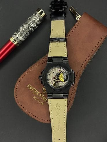 * Brend: Patek Philippe * Model: Nautilus * Növ: Kişi qol saatı * — 3