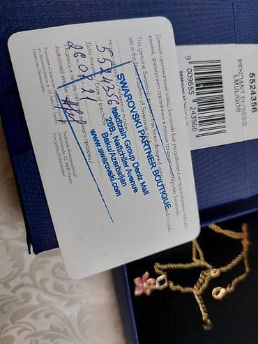 Boyunbağı, Swarovski, Ünvandan götürmə