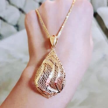 qaş sabitləyici: Dəstə daxildir: Kulon, Boyunbağı, Sarı qızıl, 750 Əyar, 819 g — 1