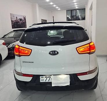 kia mini: Kia Sportage: 2 l | 2014 il — 4