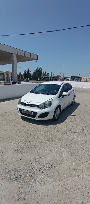 saipa satis merkezi: Kia Rio: 1.2 л | 2012 г. Хэтчбэк — 2