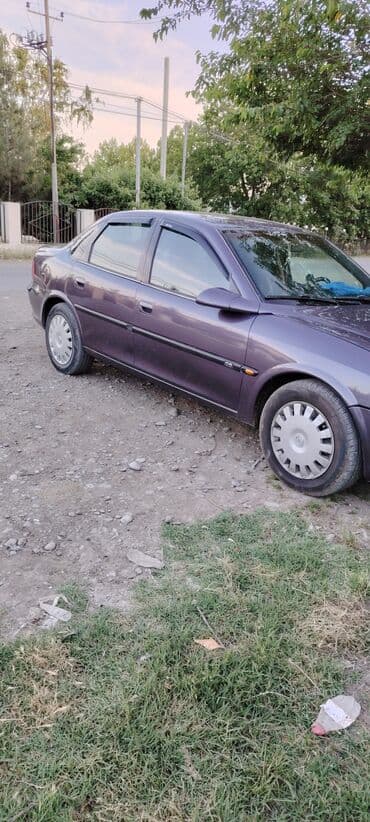 запчасти на опель вектра: Tünd göy rəngdə olan Opel Vectra sedanı. Bu avtomobil rahat və — 3