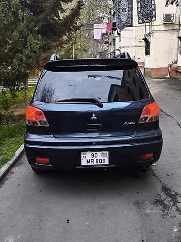 212 avtomobil: Barter Var 4gözlə Mitsubishi Outlander, 4WD, tünd mavi rəng — 1
