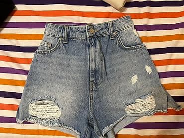 Yüksək belli cins şort. - Açıq mavi, yüngül solğun effektli denim -