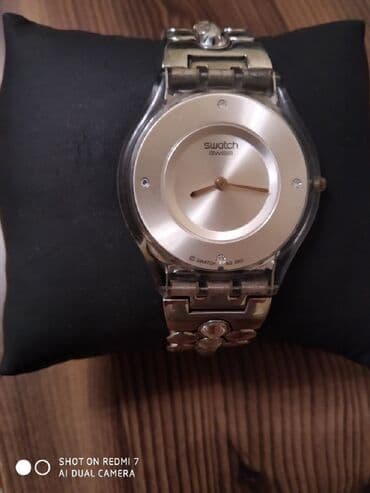 el fecr saat: İşlənmiş, Qol saatı, Swatch — 8