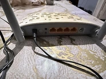 tp link qiymetleri: TP-Link TD-W8961N – 300Mbps Wireless N ADSL2+ Modem-Router — 1