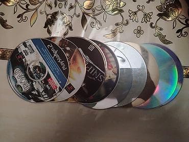 ps4 2 tb: Sony PlayStation 2 Slim komplekti 13 ədəd oyun diski var (cıziğ — 4