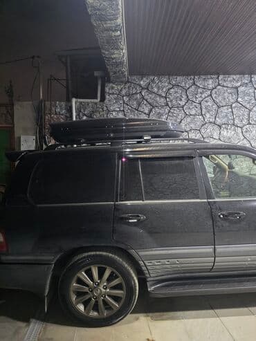 Avtomobil üçün dam baqajı (roof box) iki duqayla bir yerde -