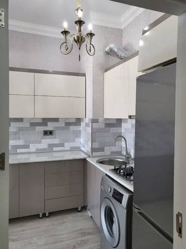 kirayə restoran: Sumqayıtda Bagca şəhər kompleksində yerləşən 16 mərtəbəli binanın — 15