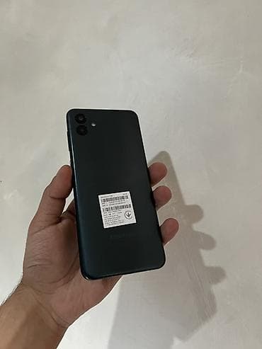 телефон fly e154: Samsung Galaxy A04, 32 ГБ, цвет - Черный, Две SIM карты — 4