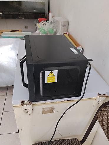 mini un dəyirmanı: Mikrodalğalı soba Toshiba, Ayrıca dayanan, Mikrodalğalar ilə, rəng - Qara, Yeni — 4