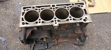 Bu, dörd silindrli mühərrik blokudur. Metal konstruksiyalıdır və