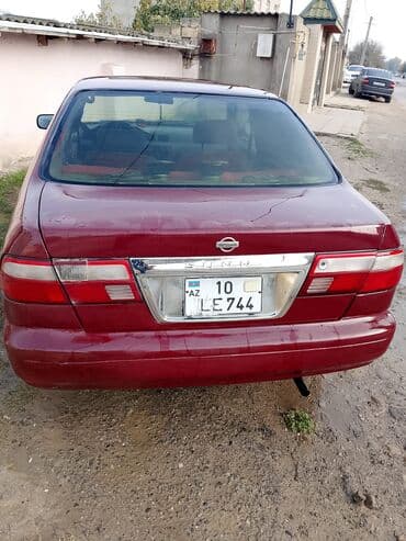 Bıçaqlar: Nissan Sunny sedan - Kuzov: 4 qapılı sedan, tünd qırmızı rəng - Nömrə — 1