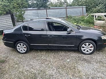 volqa ehtiyat hisseleri: Volkswagen Passat sedan. Avtomobilin salonu qara rəngdədir və ön — 7