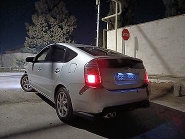 gaz 53 matoru: Toyota Prius (2-ci nəsil) hibrid hetçbek Yevropeyka. Tekerler Teze — 2