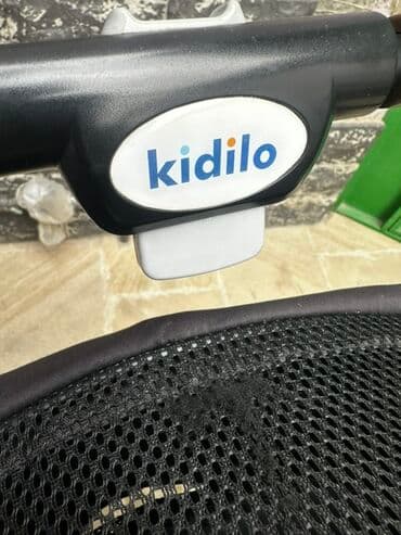 quatro mini uşaq arabaları: Qara rəngdə, Kidilo markalı uşaq arabası. Yüngül çəkisi və yığcam — 4