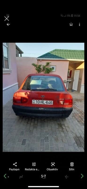 ruçnoy nə deməkdir: Satılır – Qırmızı rəngdə sedan avtomobil Model və görünüş: - Korpus — 4