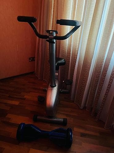Məhsul: Stasionar trenajor velosipedi və balans skuter Təsvir: - Evdə